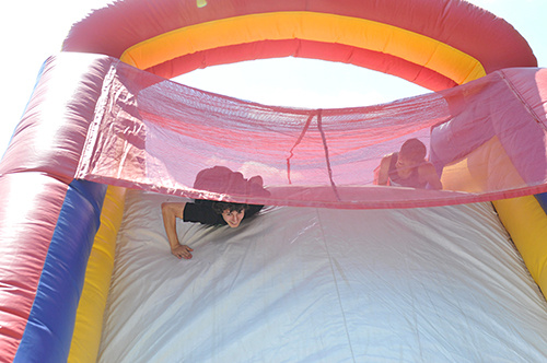 TwoStudentsOnInflatableW