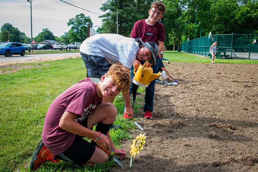 Walters planting flowers