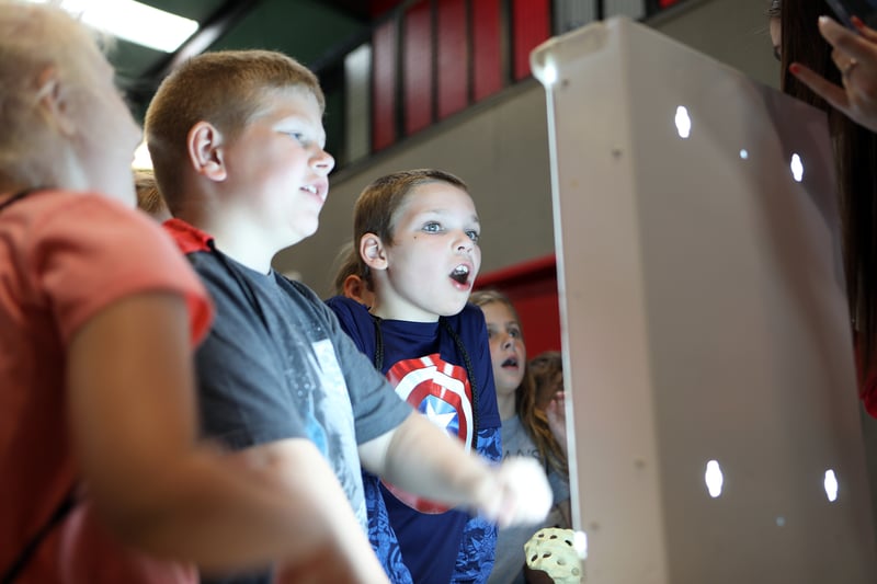 Opdyke-Belle Rive second-grade students Kaleb Fields (LEFT) and Aiden Hoard are wowed during the radiology portion of the 2022 Rend Lake College Children's Health Fair.  