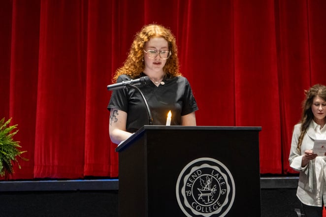 Autum Thorpe leads the LPN graduates in the Nightingale Pledge.