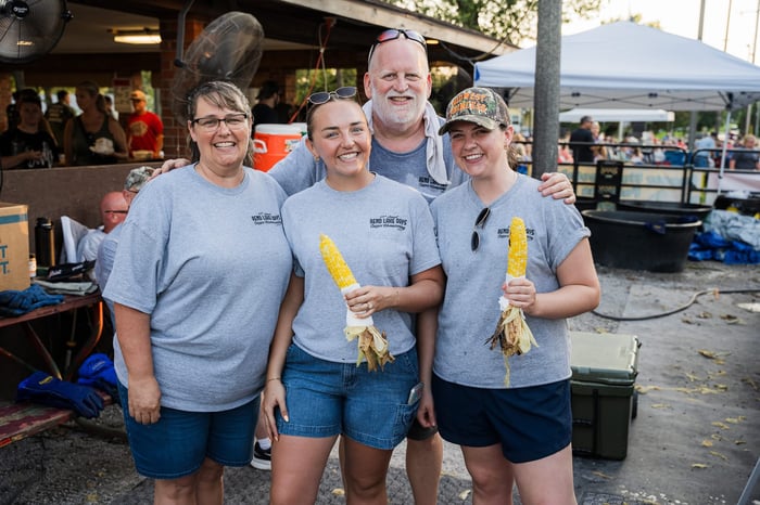 John, Teresa, and their daughters, Alecia Acosta and Maggie Stacey, pose for a family photo at the 69th Annual Rend Lake Days Sesser Homecoming event.
