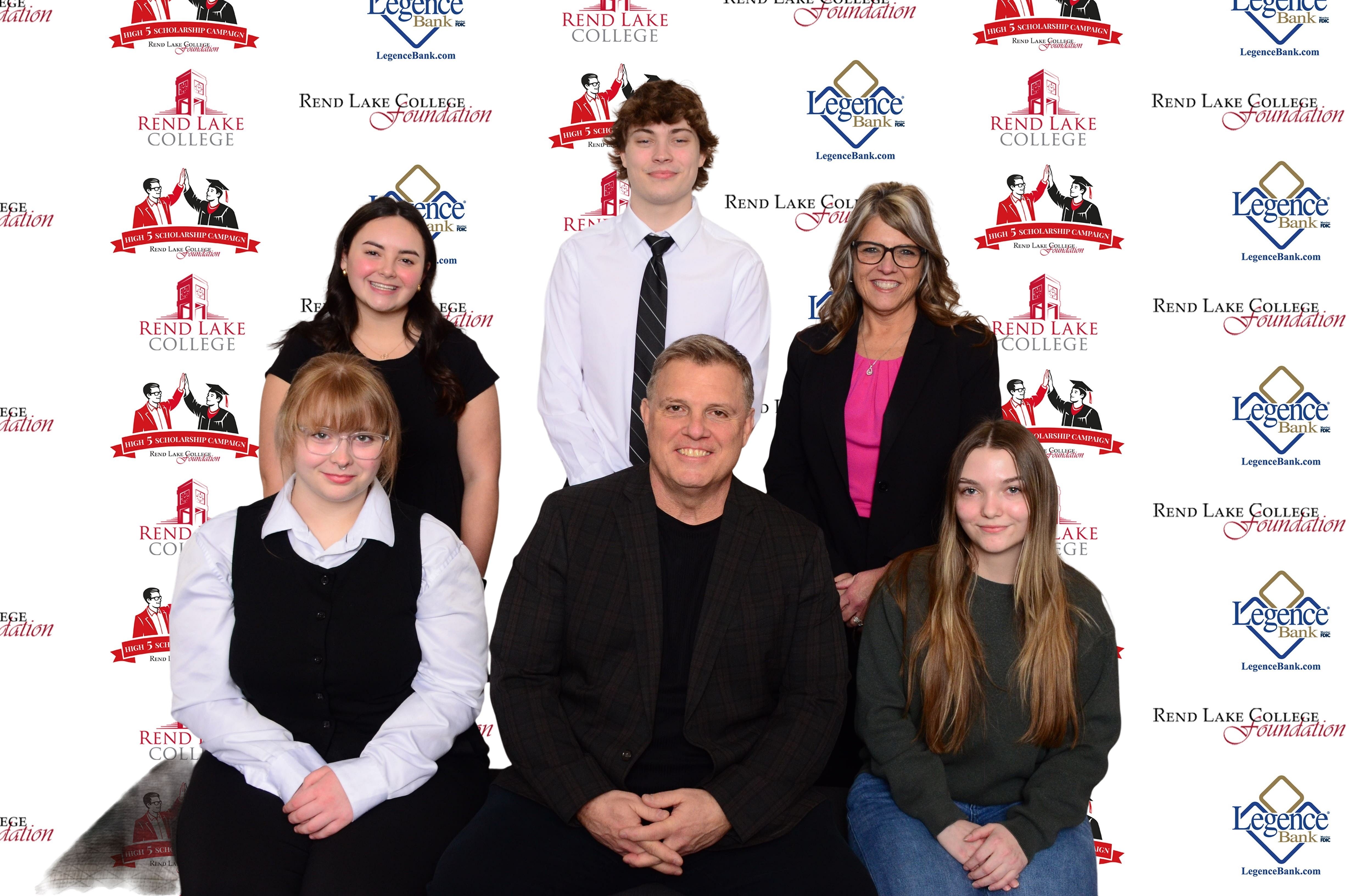 Pictured, Front Row (L-R): Scholarship Recipient Dannarai Tate, Scholarship Representative Scott Cravens, Scholarship Recipient Haylee Borgmann  Back Row (L-R): Scholarship Recipient Amelia Lamont, Scholarship Recipient Trenton Pike, Scholarship Representative Christy Caroll