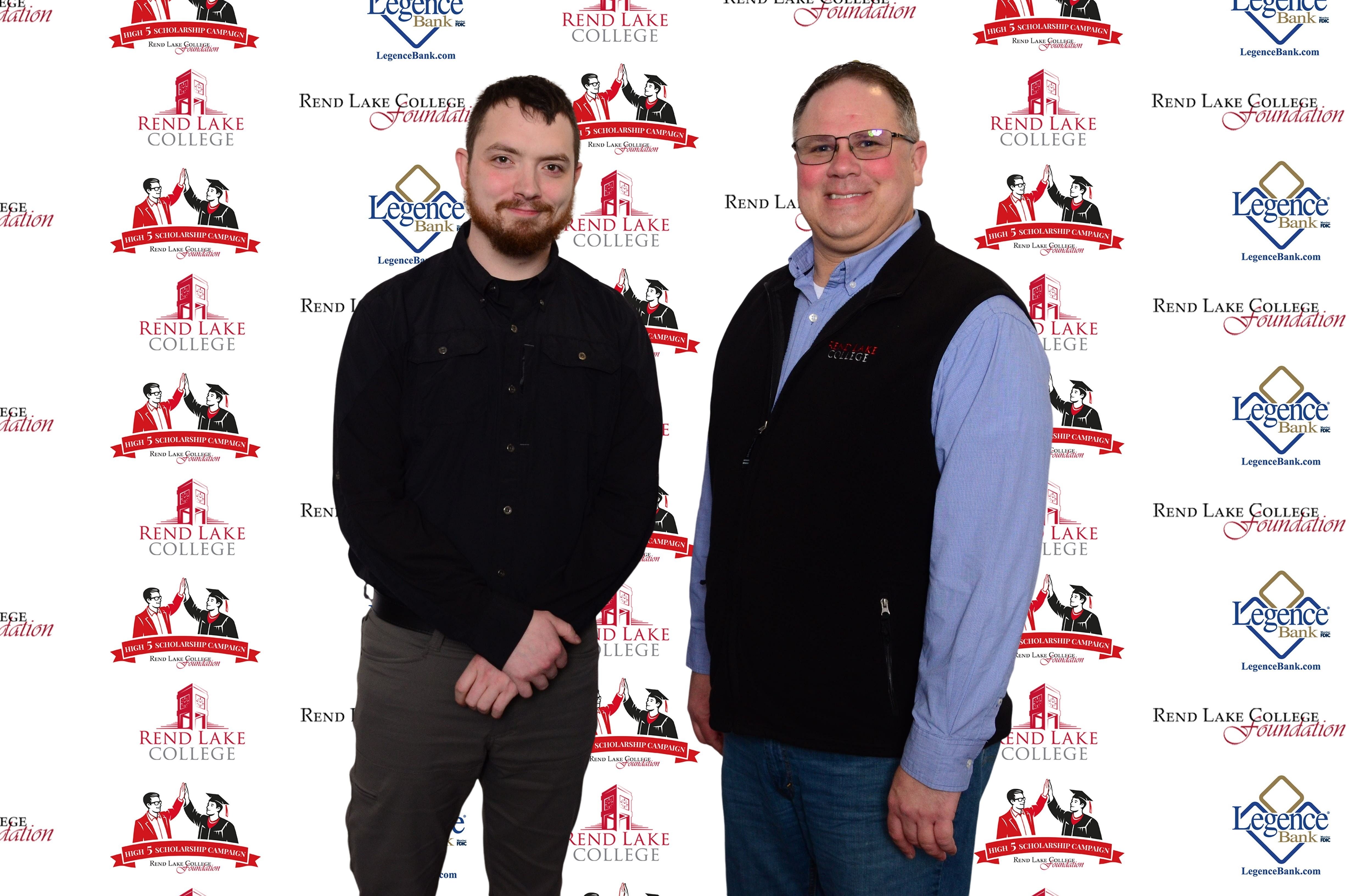 Pictured, (L-R) Scholarship Recipient Robert Bowman, Scholarship Representative Buster Leeck