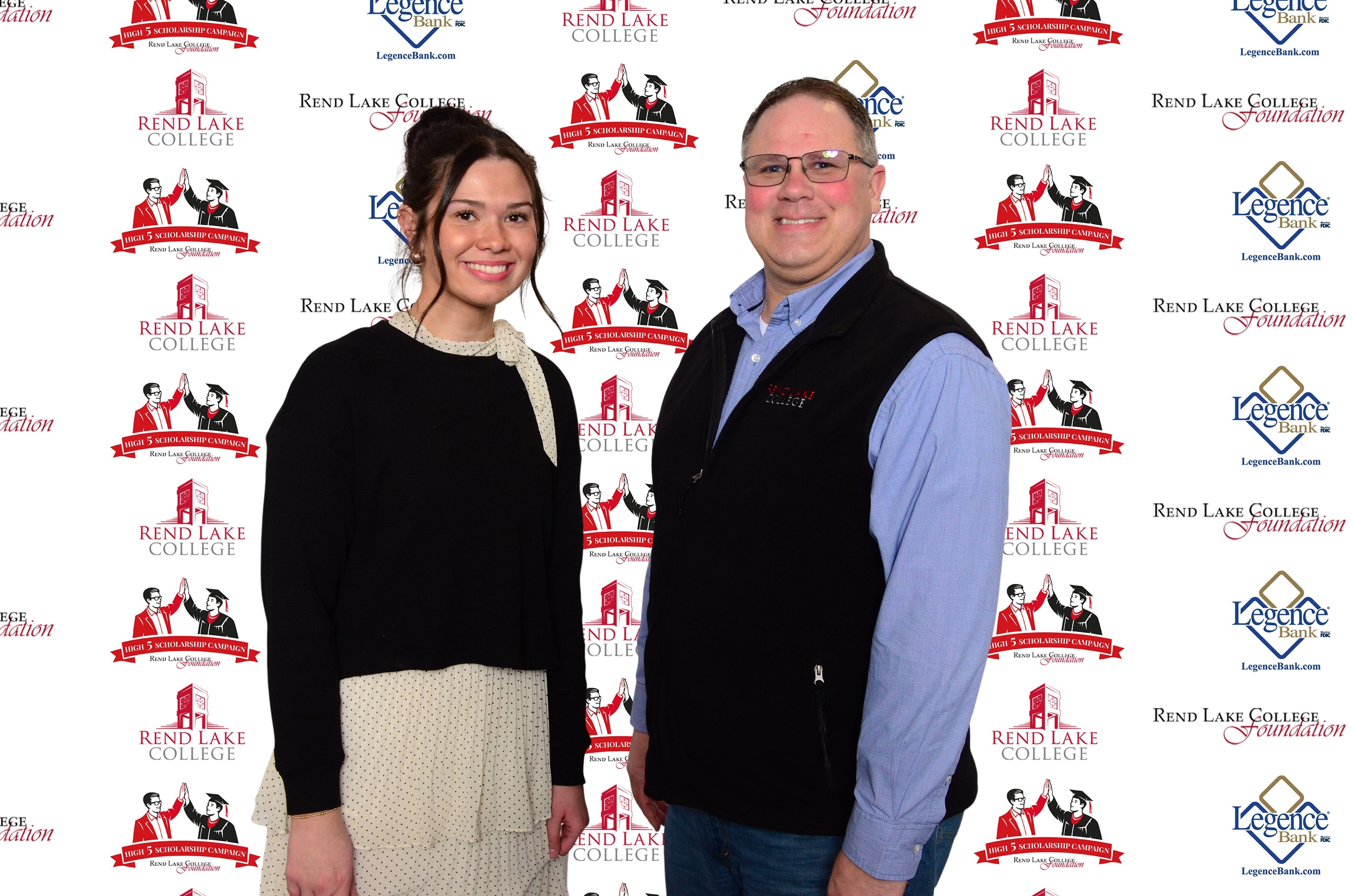 Pictured, (L-R) Scholarship Recipient Izabella Newell, Scholarship Representative Buster Leeck