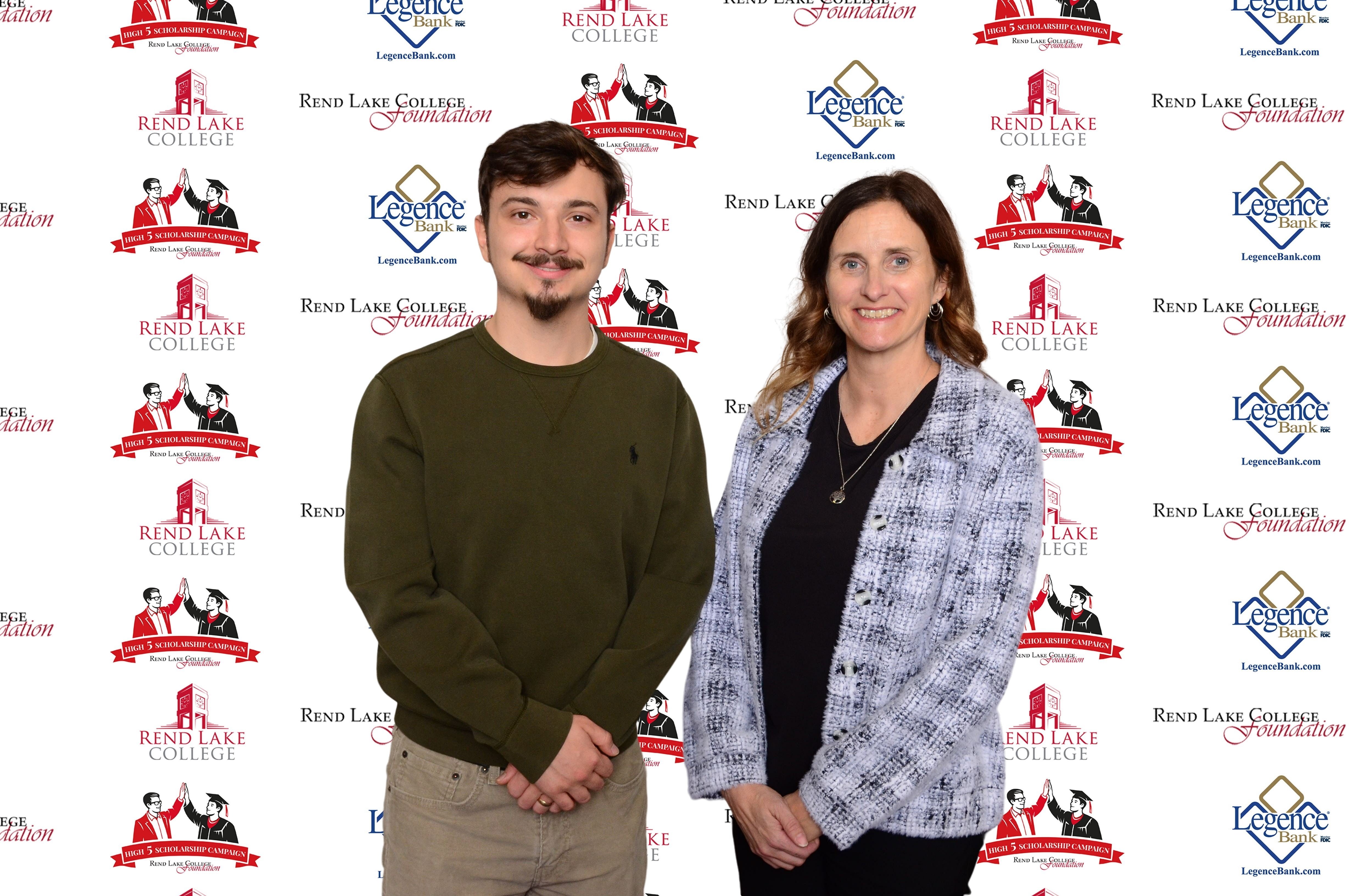 Pictured ,(L-R) Scholarship Recipient David Gove, Scholarship Representative Amy Epplin