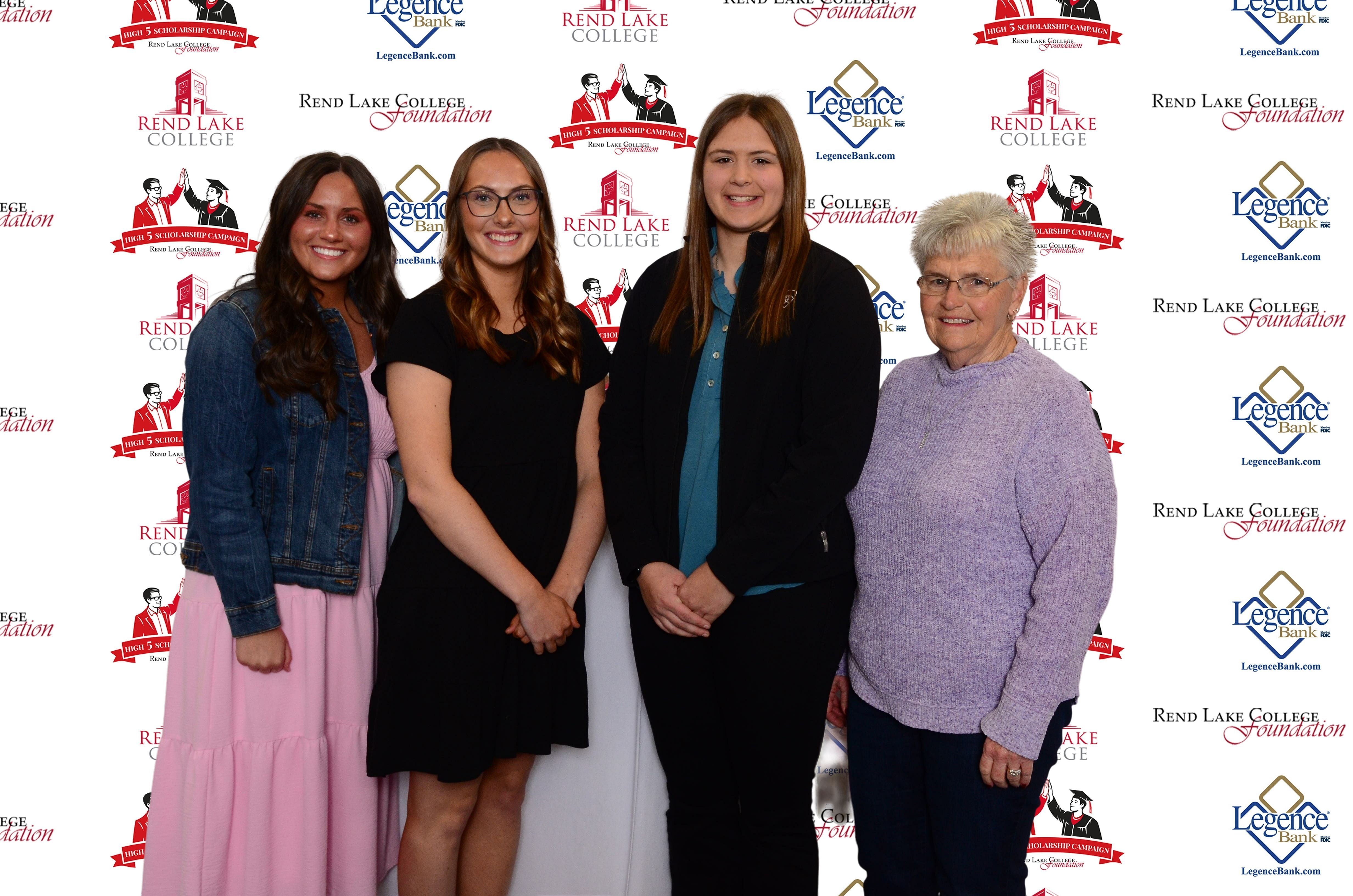 Pictured, (L-R) Scholarship Recipient Abby Erwin, Scholarship Recipient Shayla McMahon, Scholarship Recipient Kora Wellen, Scholarship Representative Shelley Allen