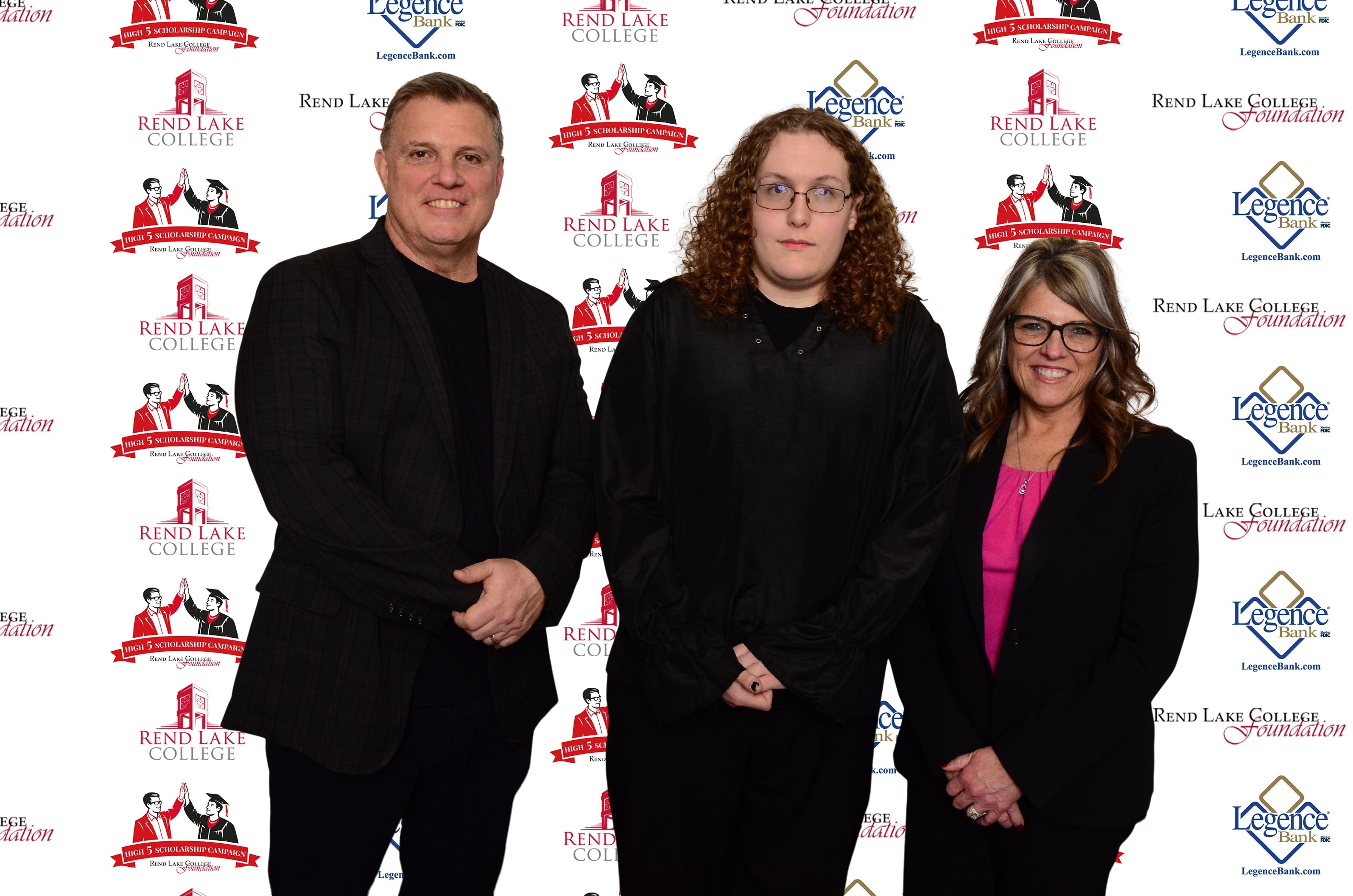 Pictured, (L-R) Scholarship Representative Scott Cravens, Scholarship Recipient Odin Poteete, Scholarship Representative Christy Caroll