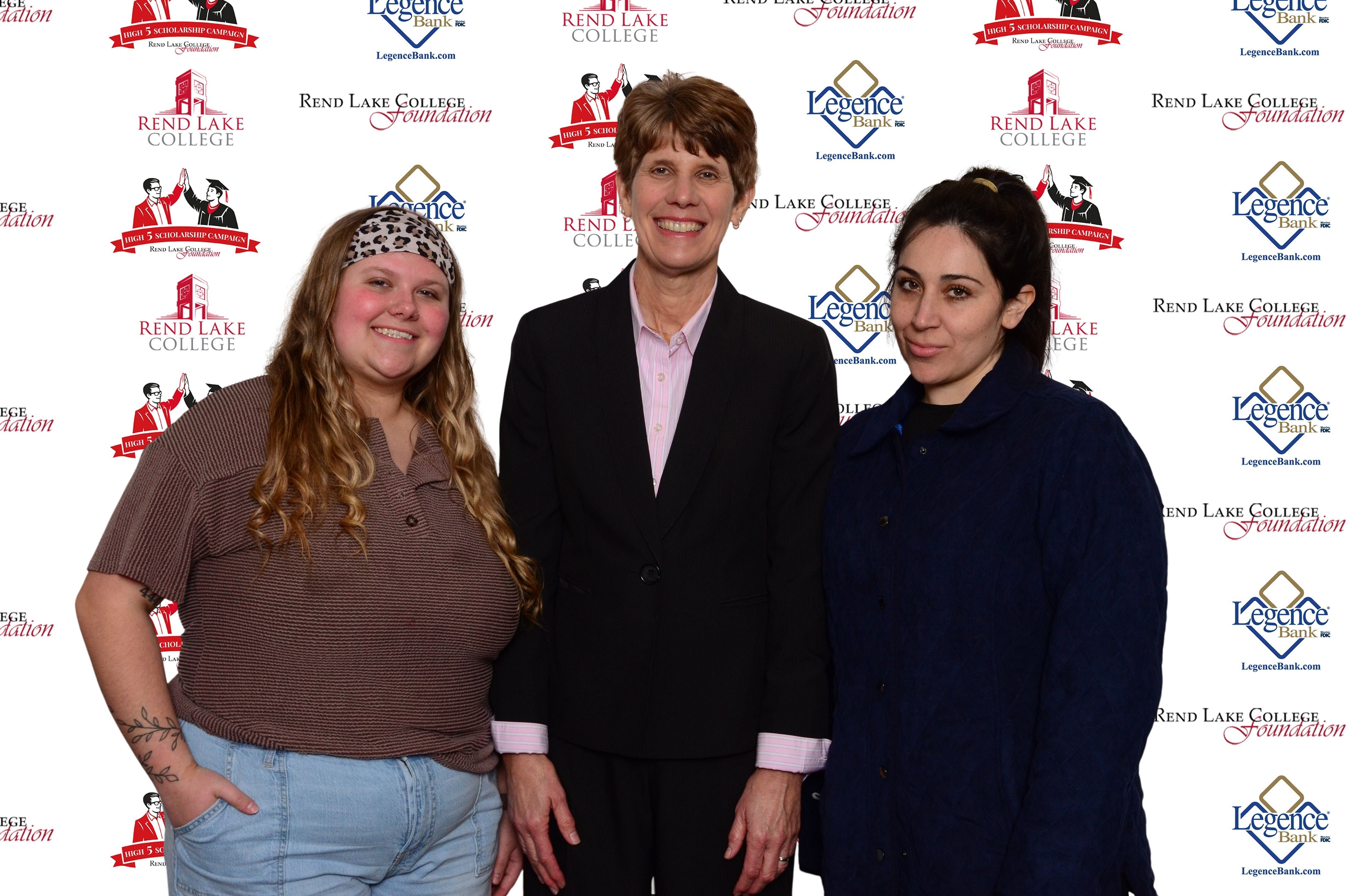 Pictured, (L-R) Scholarship Recipient Autumn Baxter, Scholarship Representative Trish Reed, Scholarship Recipient Chelsea Bonilla