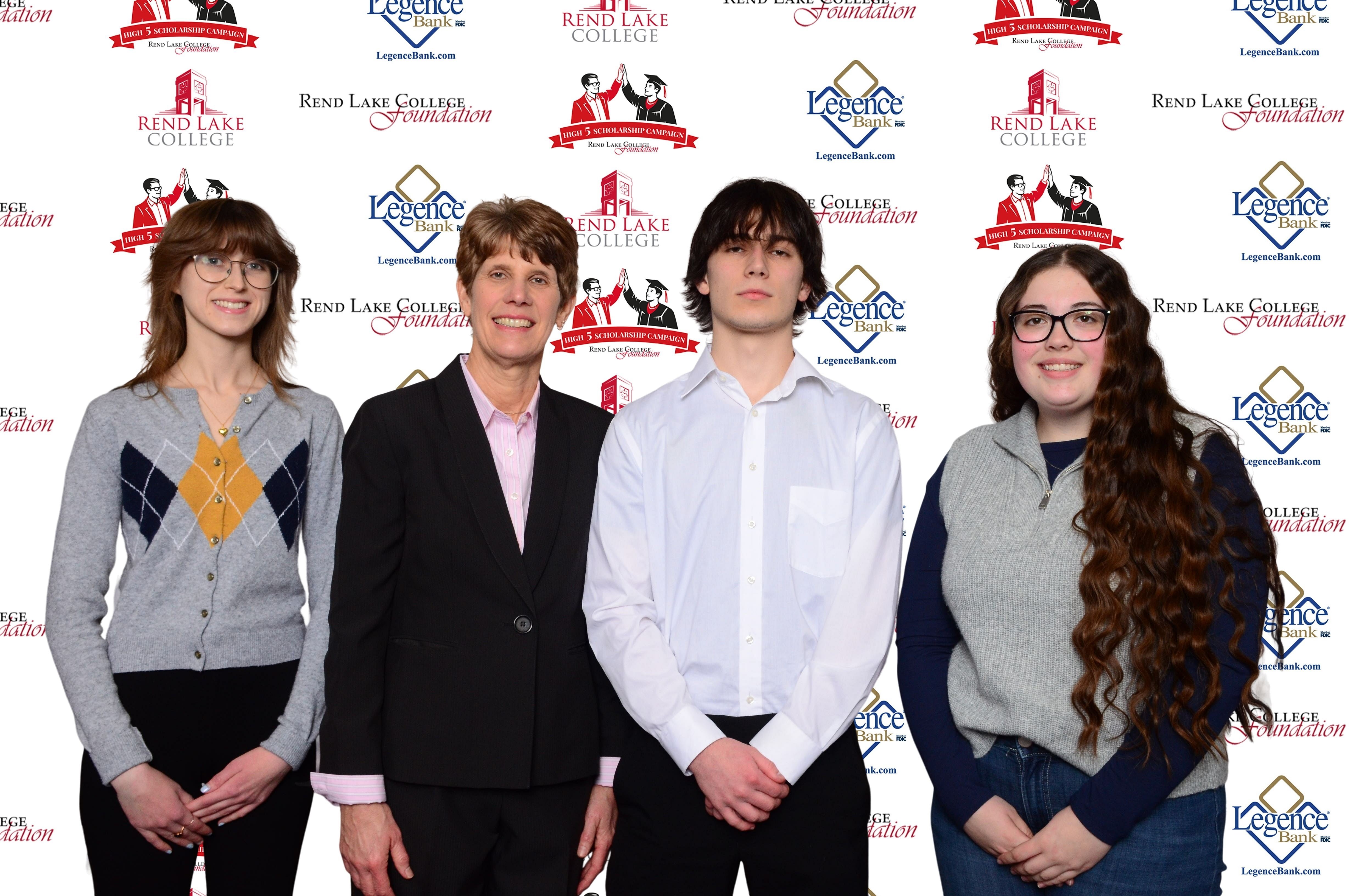 Pictured, (L-R) Scholarship Recipient Emily Heard, Scholarship Representative Trish Reed, Scholarship Recipient Jacob Davis, Scholarship Recipient Vada Webb