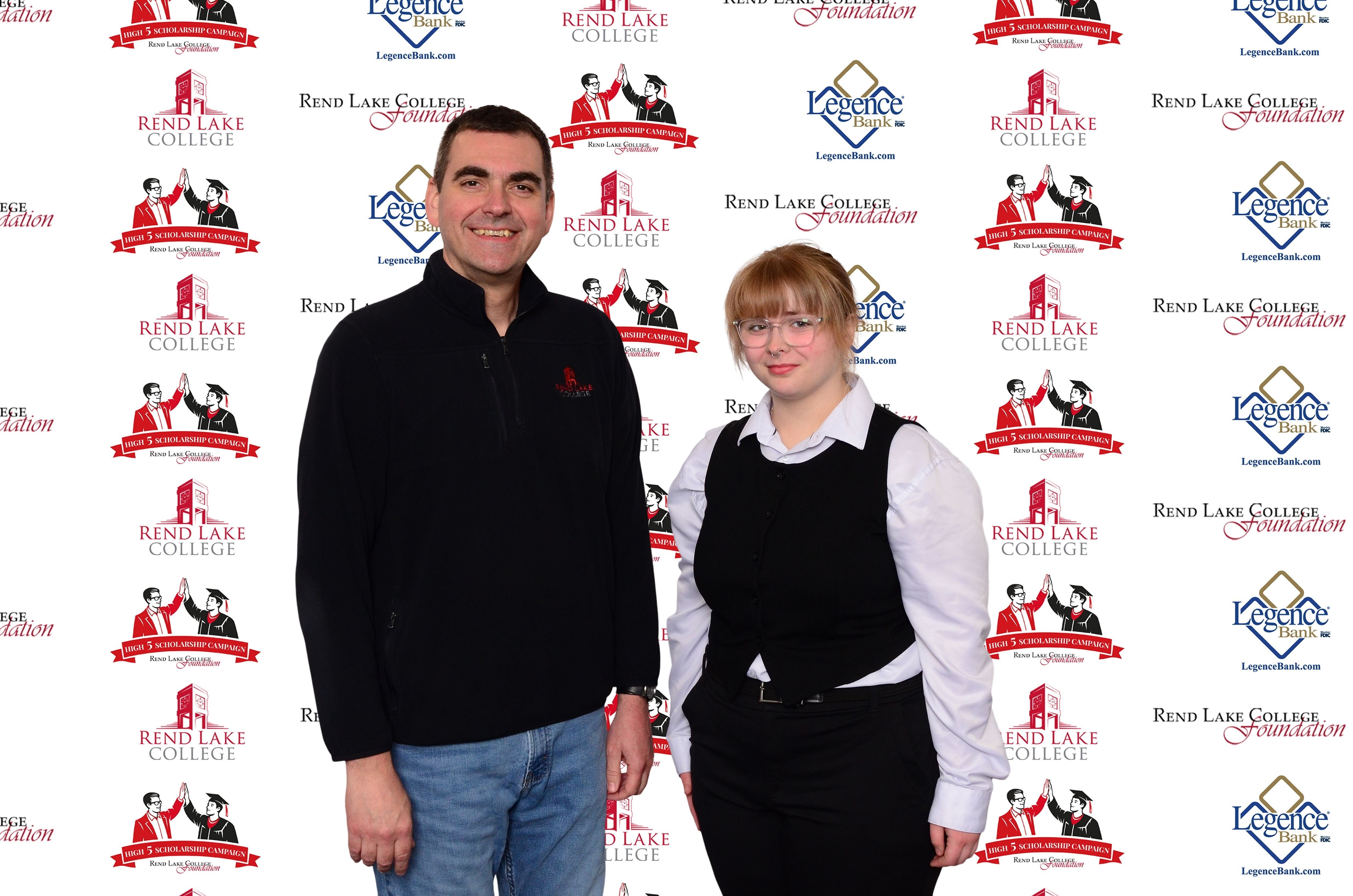 Pictured, (L-R) Scholarship Representative Chad Copple, Scholarship Recipient Dannarai Tate