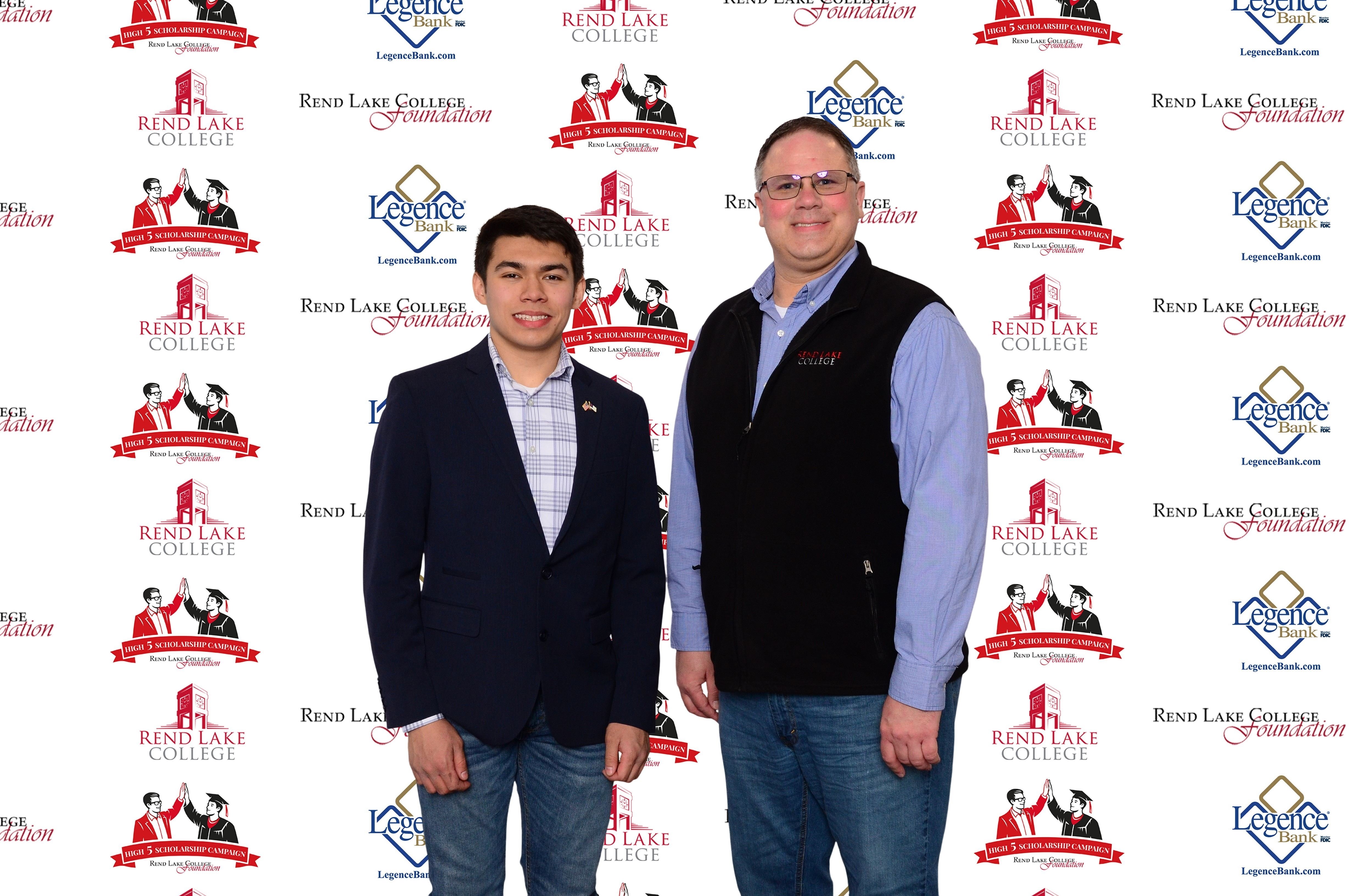 Pictured, (L-R) Scholarship Recipient James Dudely, Scholarship Representative Buster Leeck