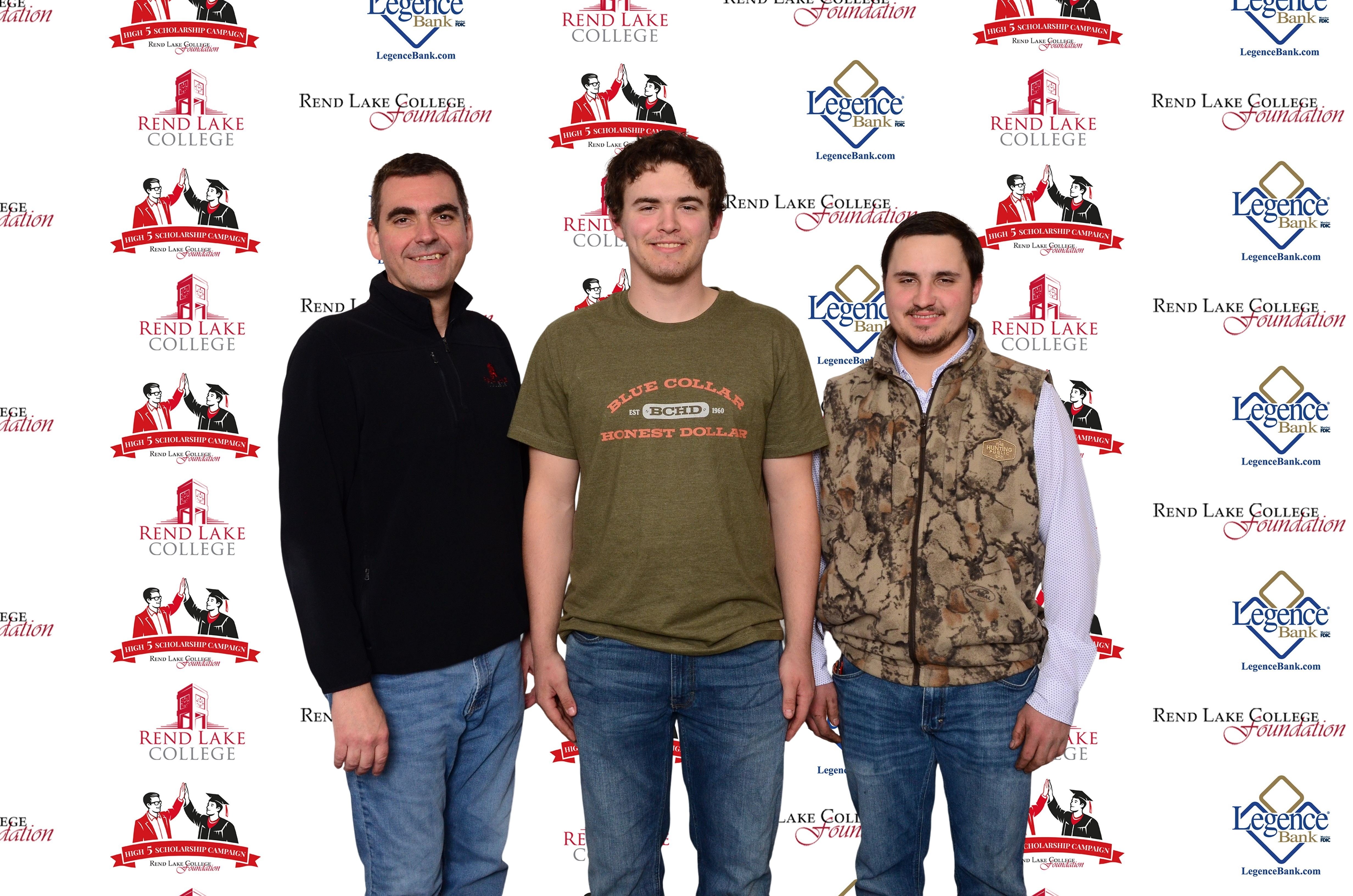 Pictured, (L-R) Scholarship Representative Chad Copple, Scholarship Recipient Wyatt Pilson, Scholarship Recipient Rilan Pressgrove